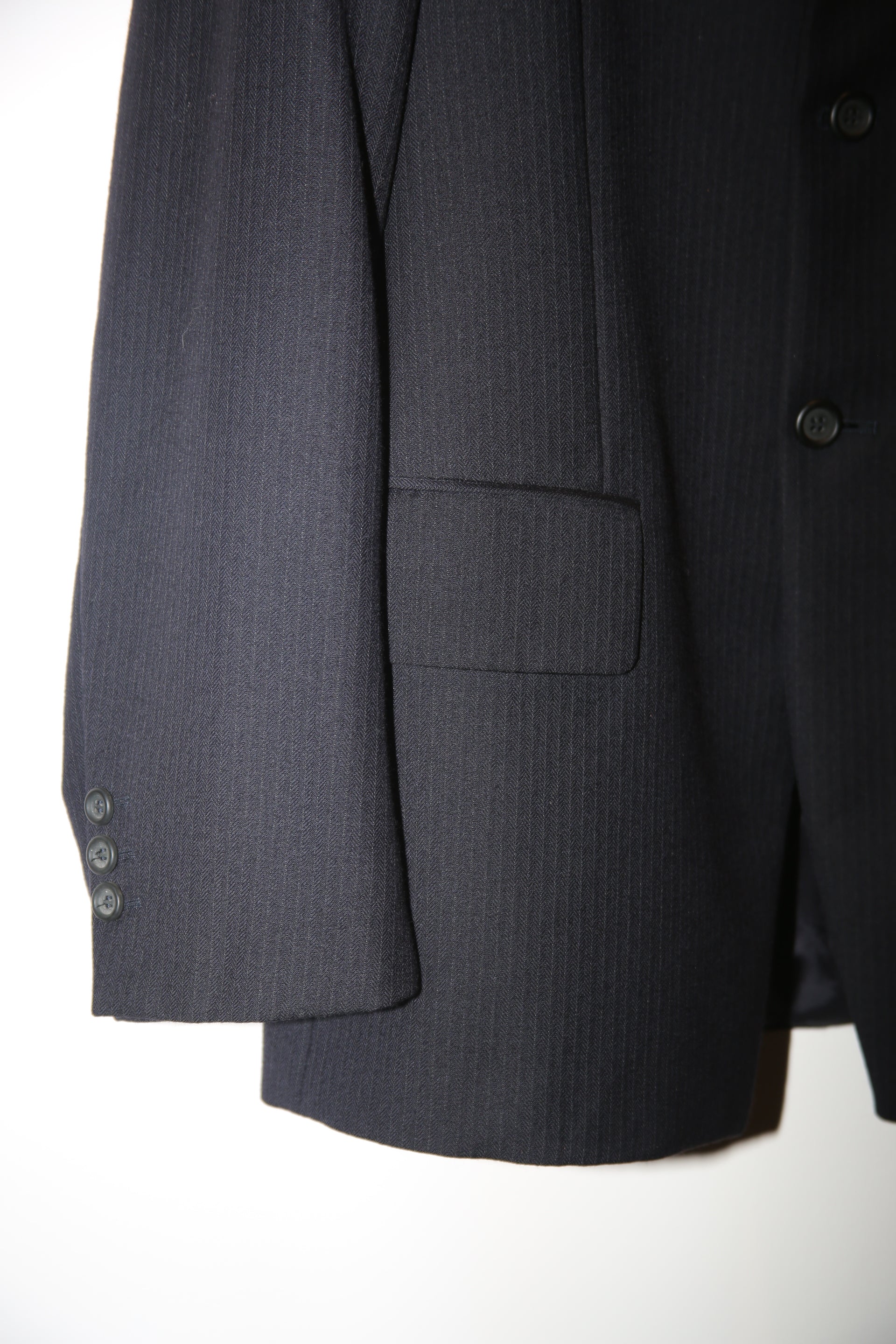 1990 DRIES VAN NOTEN / WOOL HERING BORNE TAILORED SUIT IN CHACOAL : SIZE 48