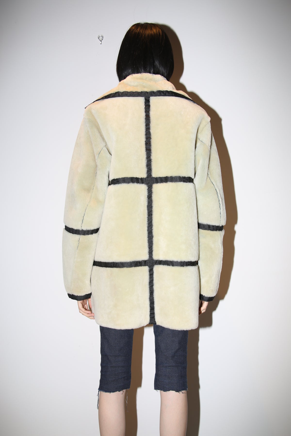 2002 CHANEL / REVERSIBLE SHEEP SKIN SHIRRING JACKET IN BLACK AND WHITE