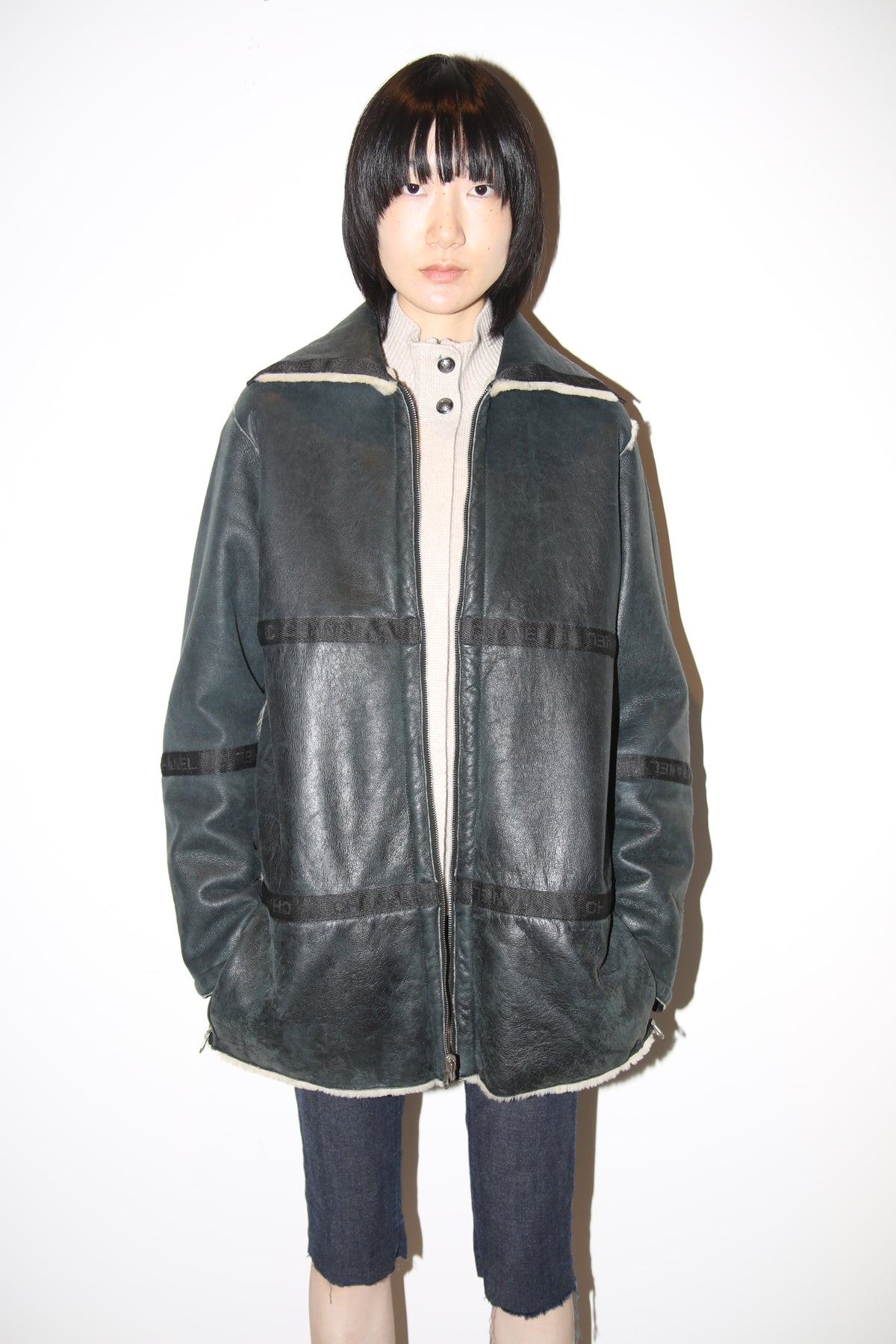2002 CHANEL / REVERSIBLE SHEEP SKIN SHIRRING JACKET IN BLACK AND WHITE