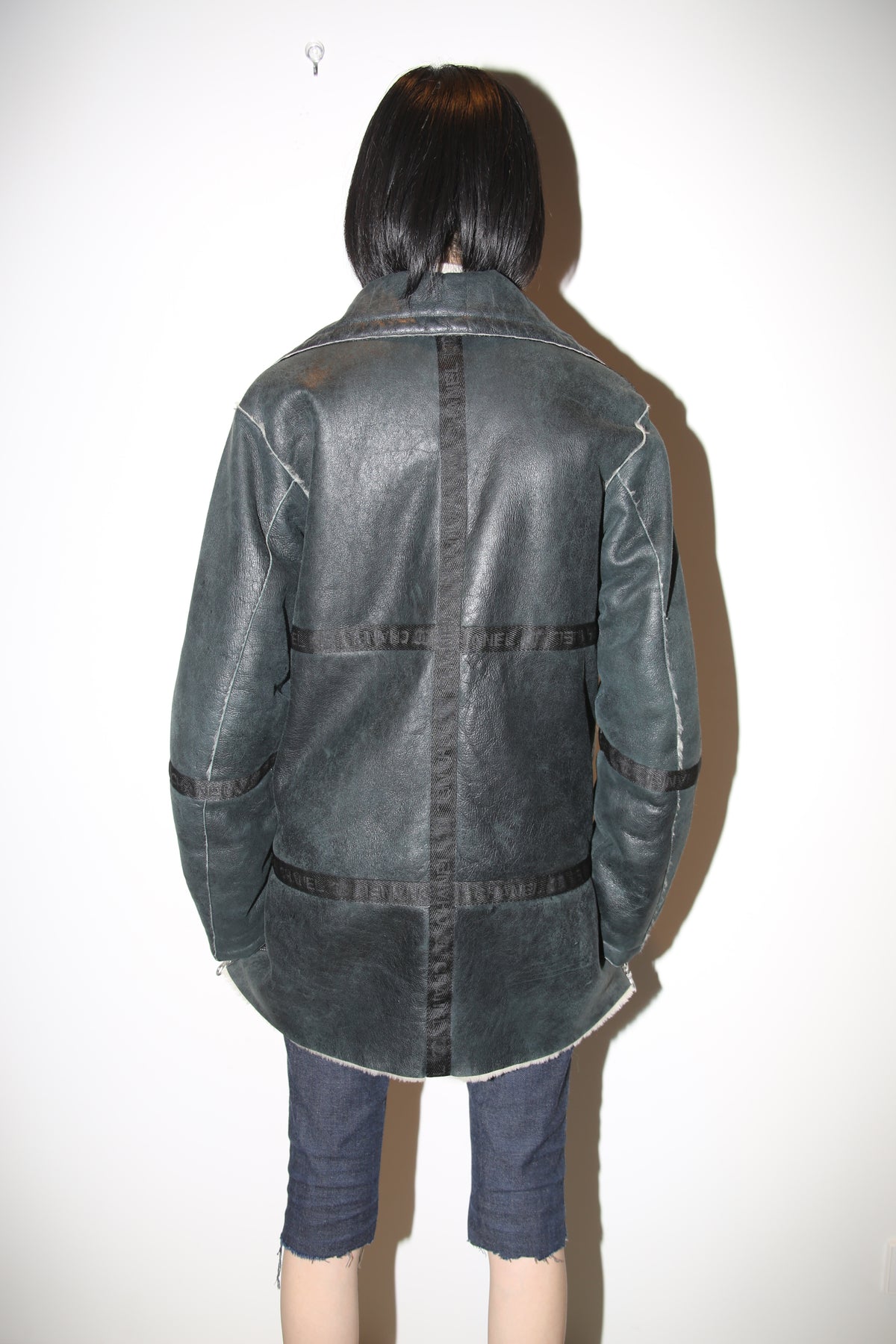 2002 CHANEL / REVERSIBLE SHEEP SKIN SHIRRING JACKET IN BLACK AND WHITE