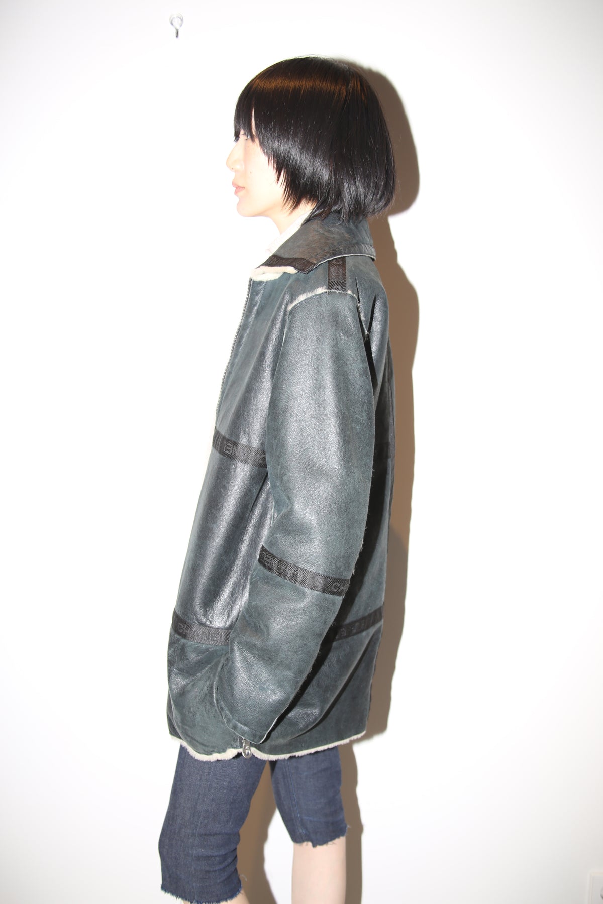 2002 CHANEL / REVERSIBLE SHEEP SKIN SHIRRING JACKET IN BLACK AND WHITE